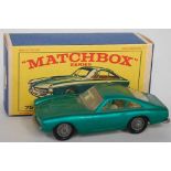 A Matchbox Regular Wheels No. 75B Ferrari Berlinetta comprising of metallic green body with clear