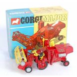 A Corgi Toys No. 1111 Massey Ferguson 780 combine harvester comprising of red body with yellow tines