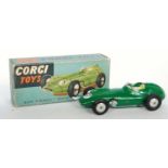 A Corgi Toys No. 152 BRM F1 Grand Prix race car comprising of dark green body with lemon interior