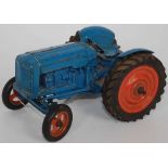 A Chad Valley diecast and clockwork model of Fordson Major tractor comprising of blue body with