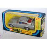 A Corgi Toys No. 270 James Bond Aston Martin comprising of silver body with red interior and two