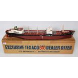 A Texaco Exclusive Dealer Offer plastic and battery operated model of a Texaco North Dakota C-