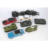 A collection of large scale Dinky Toys loose saloons, and a quantity of Dinky and Solido military