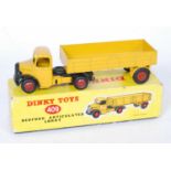 A Dinky Toys No.409 Bedford articulated lorry, comprising of yellow body and red hubs, sold in the