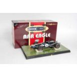 A Carousel 1/Mason Distributing Company No. 10001-CAR 1/18 scale model of a 1967 No. 9 Dan Gurney