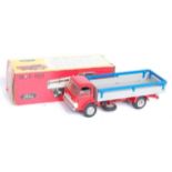 A Tekno No. 915 Ford D series truck, comprising red cab and chassis with grey back and grey hubs,