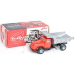 A Tekno No. 862 Volvo quarry truck, comprising of orange cab with black chassis, finished with