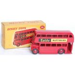 A Dinky Toys No. 291 London Bus comprising red body with matching hubs and Exide Batteries livery,