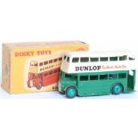 A Dinky Toys No. 290 Dunlop double decker bus comprising of cream and green body with light green