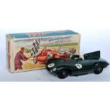 A Crescent Toys No. 1292 Jaguar Type D Grand Prix race car, comprising dark green body with white