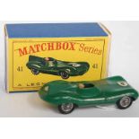A Matchbox 1/75 series No. 41B Jaguar D-type saloon, comprising of green body with brown driver