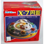 A Modern Toys of Japan tinplate plastic and battery operated model of an X-7 spaceship comprising of