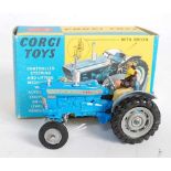 A Corgi Toys No. 67 Ford 5000 Super major tractor finished in blue with grey hubs and driver figure,