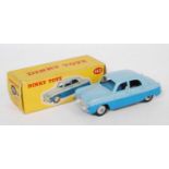 A Dinky Toys No.162 Ford Zephyr saloon, comprising two-tone blue body with grey hubs, housed in