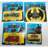 Four various carded Batman ERTL diecasts to include Batmobile, Batwing, Joker van, and a smaller