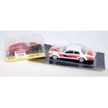 A Dinky Toys carded and plastic cased boxed race car group to include a No. 216 Dino Ferrari