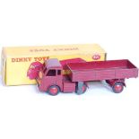 A Dinky Toys No. 421, British Railways electric articulated lorry comprising of maroon body with red