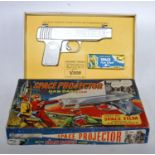 A J&L Randall Ltd Dan Dare Space Projector with film strip, finished in the form of a space age gun,