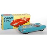 A Corgi Toys No. 151 Lotus Mk11 Le Mans race car finished in turquoise blue with red interior and