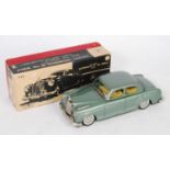 A Bandai of Japan No.732 tinplate and friction drive model of a Mercedes Benz 219 Sedan, finished in