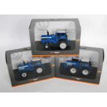 A Universal Hobbies 1/32 scale Ford diecast tractor group to include a UH4024 Ford TW30 4x2 tractor,