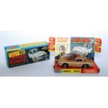 A Corgi Toys No. 261 James Bond Aston Martin DB5 comprising gold body with red interior, cast wire