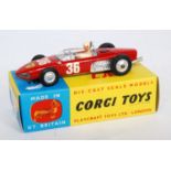 A Corgi Toy No. 154 Ferrari F1 racing car comprising red body with racing No. 36 and spun hubs,