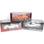 An Auto Art, Minichamps, and Bean Stalk 1/18 scale boxed racing car diecast group to include an Auto