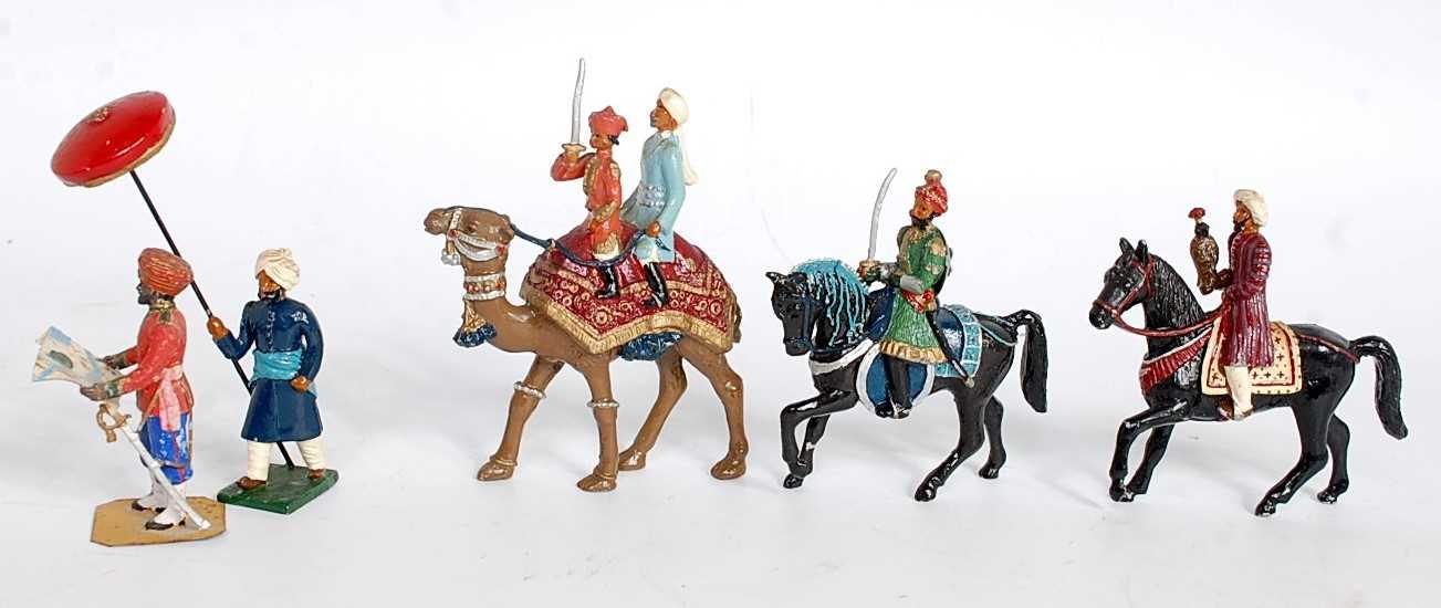 A collection of various loose Maharajah and Indian military figures to include Maharaja on camel