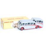 A Dinky Toys No. 280/29F Observation Coach, comprising of grey and red body with red hubs, housed in