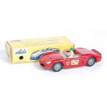 A Solido No. 129 Ferrari 2L5 race car comprising red body with brown interior and driver figure,