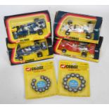 A Corgi Toys boxed Formula 1 diecast group, together with two sealed packs of Corgi Golden Jacks