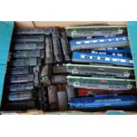 Three trays containing large quantity of made up Kitmaster and Airfix locomotive and rolling stock