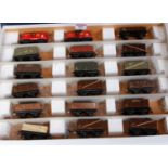 Tray containing 18 pre-war Trix Twin wagons, various companies, and 2 red Shell oil tank wagons (G)