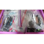 Plastic crate containing a large quantity of loco bodies, tenders, chassis and motor by Hornby,