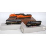 Con-Car H0 EMD E-8 units Great Northern (G-BG) and Bachmann EMD F7A and F7B units Pennsylvania black