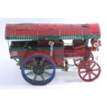 A Meccano home construction model of a Fowler Showman's engine, mainly constructed from red, green