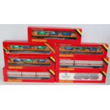 A collection of boxed Hornby 00 gauge diesel locomotives and rolling stock to include a No. R084