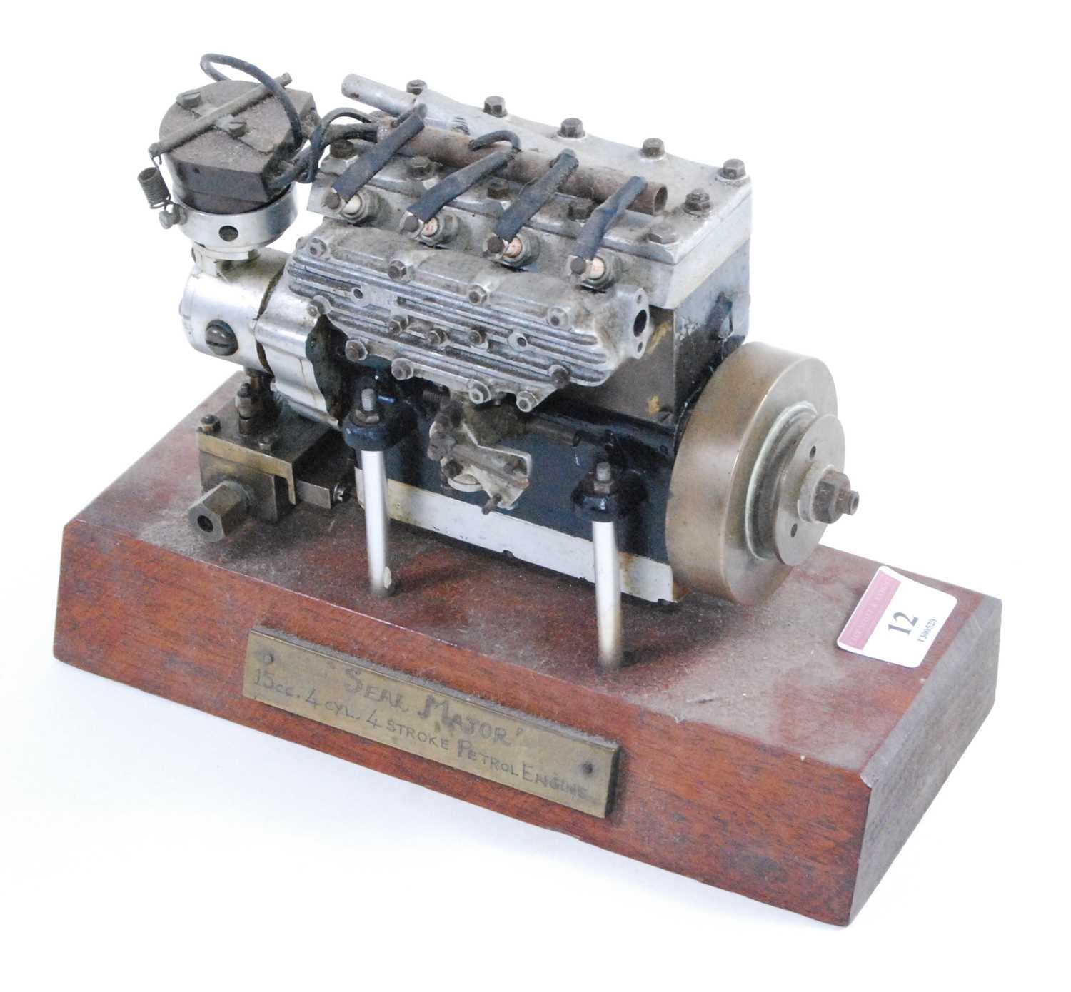 A well-engineered model of a Seal Major 15cc four cylinder four-stroke petrol engine, original