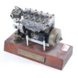 A well-engineered model of a Seal Major 15cc four cylinder four-stroke petrol engine, original