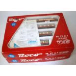 A Roco H0 4 car TEE (Trans Europe Express) train pack DB maroon/cream (G-BG) together with a