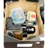A box of miscellaneous items to include lacquered brass monocular student's microscope, various