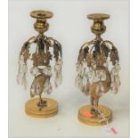 A pair of late 19th century brass table candlesticks, in the manner of Thomas Abbott, each having
