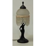 An Art Nouveau style spelter figural table lamp, in the form of a lady with hand on hip and