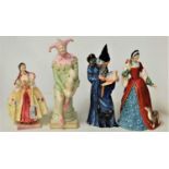 A collection of four Royal Doulton figurines, comprising Virginia HN1693, The Wizard HN2877, The