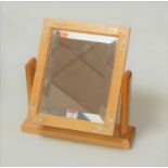 A modern Carrick of Scotland swing framed toiletry mirror, having white metal inlaid corners, w.