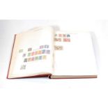 An Ideal Postage Stamp Album and contents