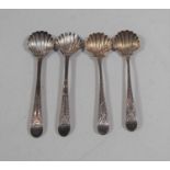 A set of four George III silver salt spoons, each having shell shaped bowl and bright cut stems,