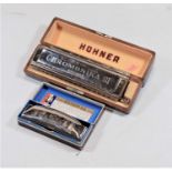 A Hohner chromonika 3 harmonica in fitted case, together with one other boxed Hohner harmonica (2)