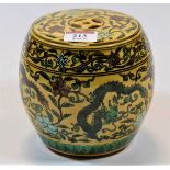 A reproduction Chinese stoneware barrel, the yellow ground decorated with dragons, within floral